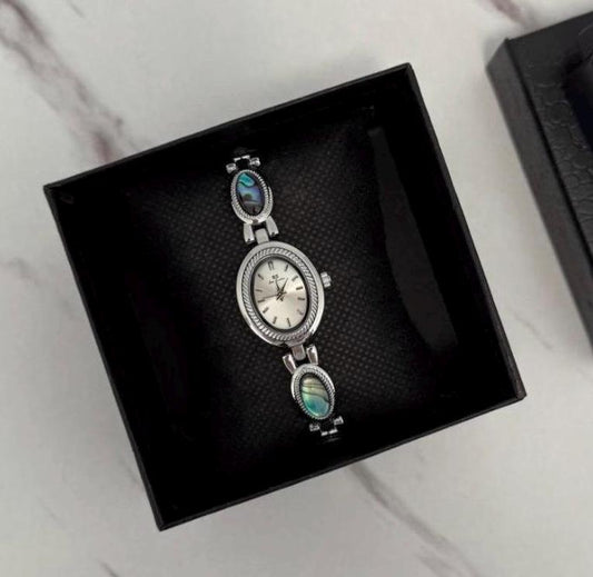 vintage gold blue stones abalone watch