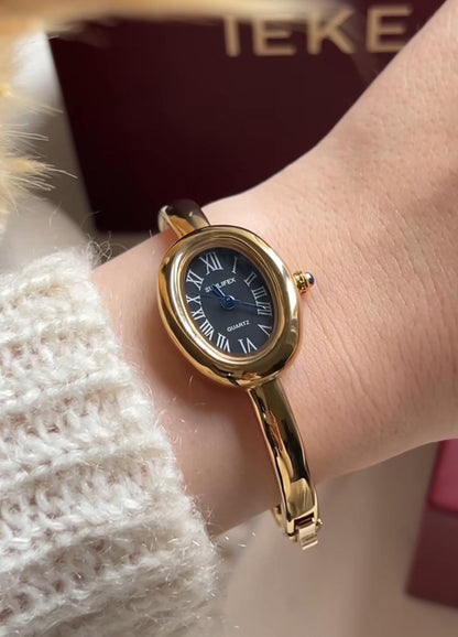 Gold and silver bangle watch | Vintage inspired