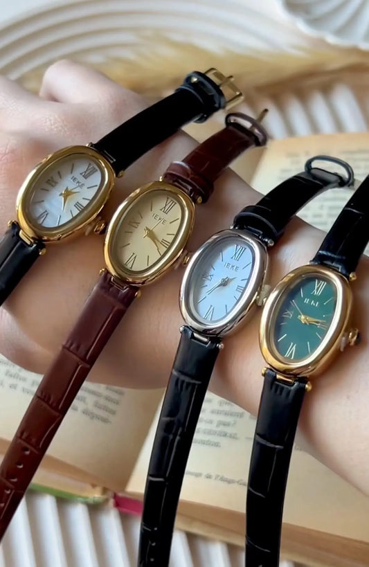 Leather gold watch | oval dial