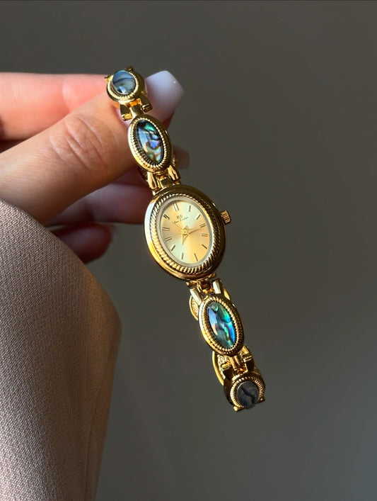 vintage gold blue stones abalone watch